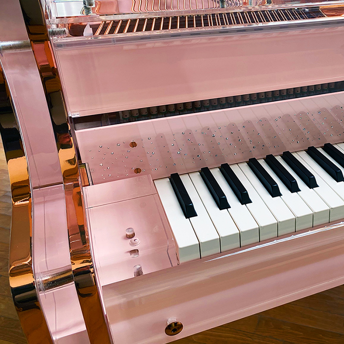 Bespoke piano in pink finish with crystal detailing