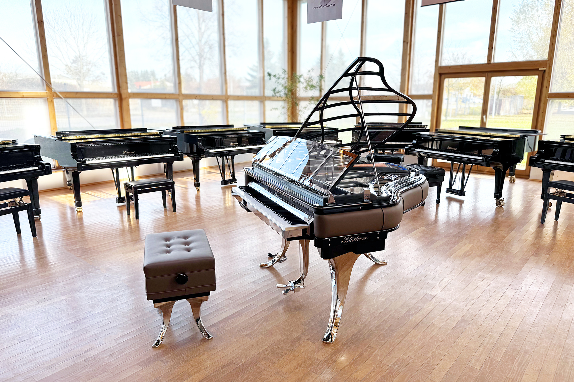 Original Blüthner PH Piano 150cm with brown leather, chrome metal fittings and a black iron frame