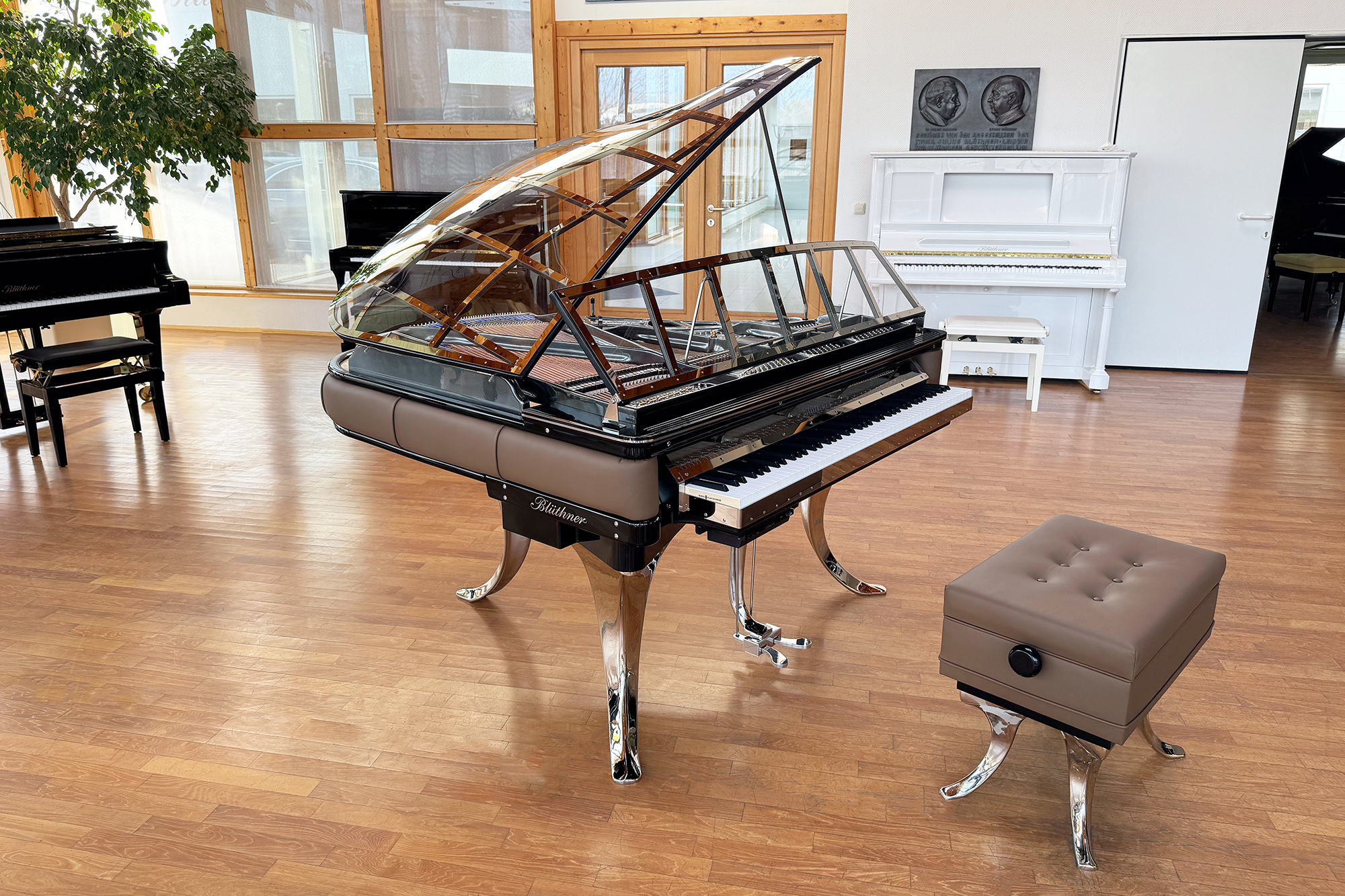 Original Blüthner PH Piano 150cm with brown leather, chrome metal fittings and a black iron frame