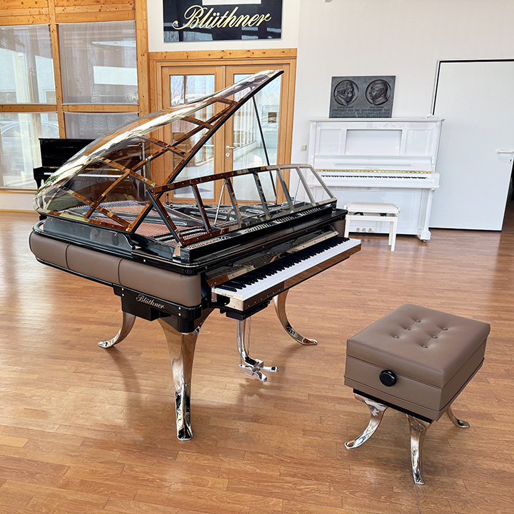 Original Blüthner PH Piano 150cm with brown leather, chrome metal fittings and a black iron frame