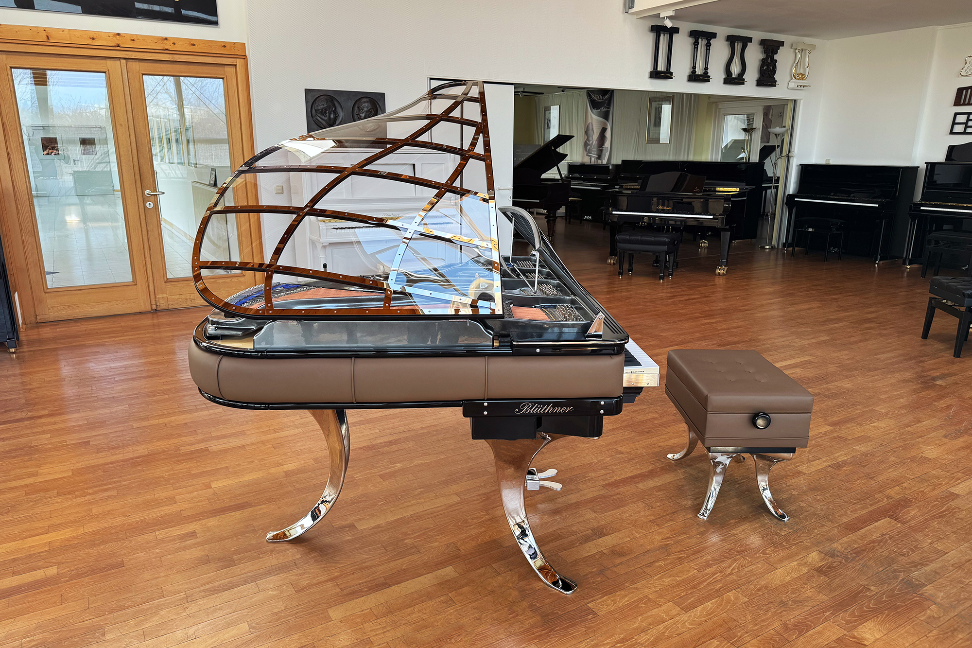 Original Blüthner PH Piano 150cm with brown leather, chrome metal fittings and a black iron frame
