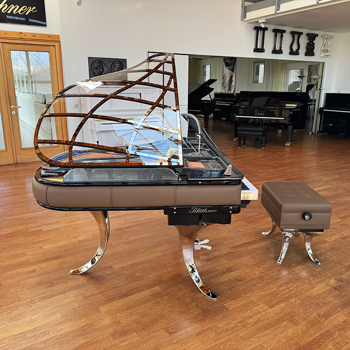 Original Blüthner PH Piano 150cm with brown leather, chrome metal fittings and a black iron frame